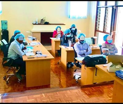 College students in lecture halls. 6 at Bukah College